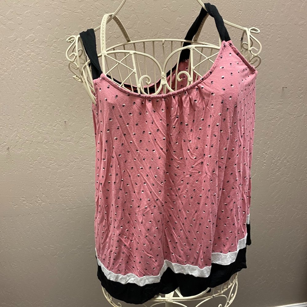 pink, white, and black sleeping wear set with dots